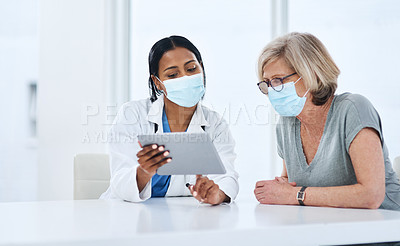 Buy stock photo Doctor, woman and tablet for covid consultation in hospital, talk and advice for healthcare, wellness and support. Medic, patient and face mask for ppe with digital touchscreen, results and feedback