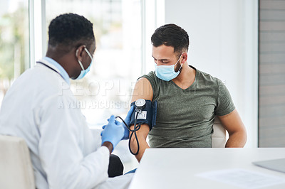 Buy stock photo Covid, mask and doctor test blood pressure of patient in a hospital or cardiology exam by medical worker in a clinic. Hypertension, help and professional healthcare employee consulting man for corona