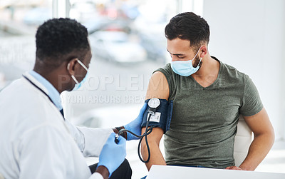 Buy stock photo Covid, mask and doctor exam hypertension of a patient in a hospital or cardiology test by medical worker in a clinic. Health, man and professional healthcare employee consulting for blood pressure