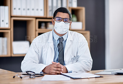 Buy stock photo Doctor wearing covid mask in clinic to prevent spread of pandemic virus, disease or illness in hospital consult. Portrait of medical professional, healthcare oe frontline worker ready to treat people