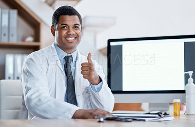 Buy stock photo Doctor, medical practitioner and healthcare worker showing thumbs up for FDA or drug approval in a hospital with blank screen copy space on a computer. GP pleased with clinic success in his office