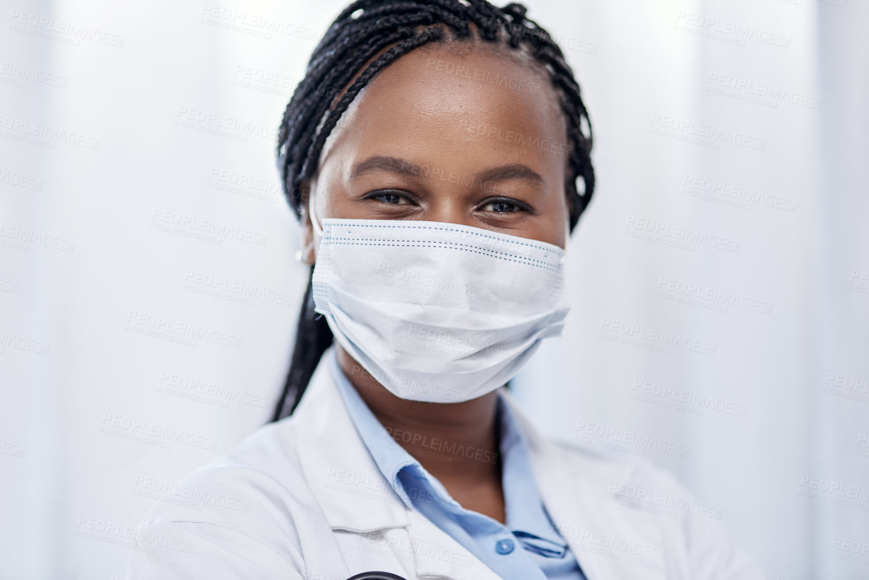 Buy stock photo Doctor wearing hygiene face mask for covid, safety and precaution in the healthcare industry. Portrait and face of confident black medical practitioner and coronavirus frontline worker in a hospital