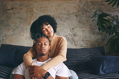 Buy stock photo Love, relax and peace with couple on sofa for care, support and bonding together. Happiness, loyalty and hug with African man and woman in living room of home for calm, connection and trust.