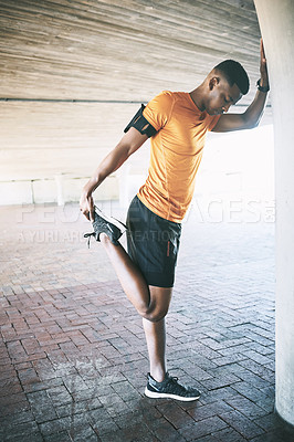 Buy stock photo Fitness, urban and black man with legs for stretching, physical activity or endurance for workout. Warm up, athlete and male person with balance for exercise, wellness development or training outdoor