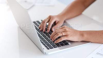 Buy stock photo Closeup shot fo an unrecognisable businesswoman using a laptop in an office