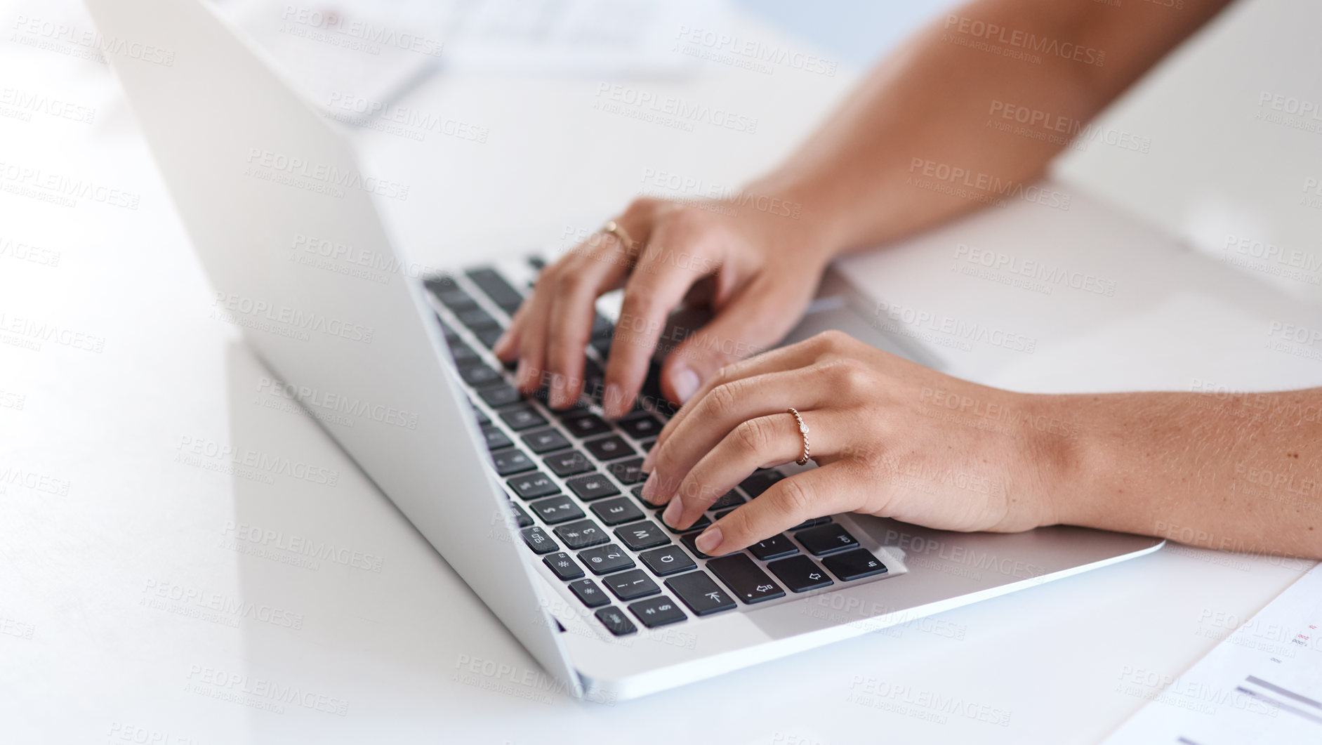 Buy stock photo Closeup shot fo an unrecognisable businesswoman using a laptop in an office