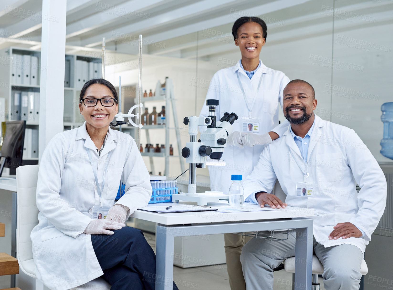 Buy stock photo Portrait of a group of scientists working in a lab