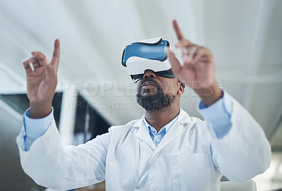 Buy stock photo Shot of a mature scientist using a virtual reality headset while working in a lab