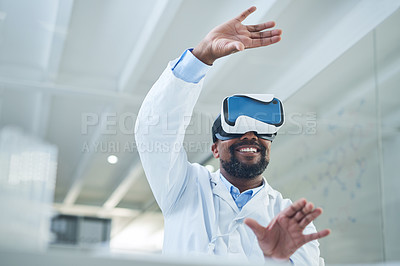 Buy stock photo Shot of a mature scientist using a virtual reality headset while working in a lab