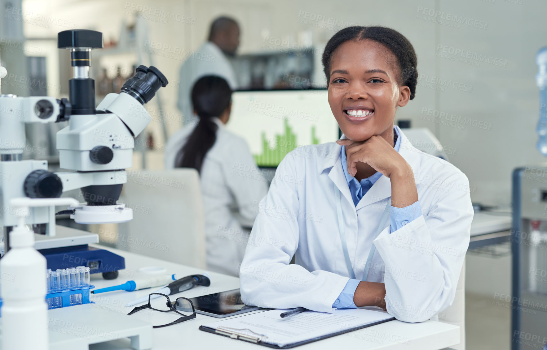 Buy stock photo Portrait of a young scientist working in a lab