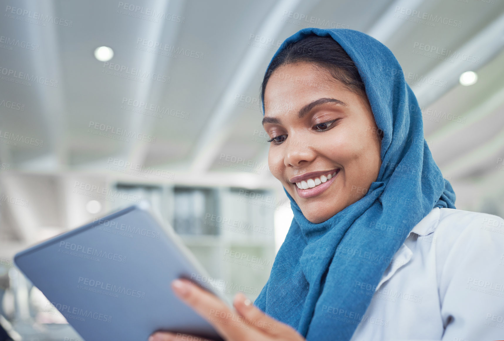 Buy stock photo Shot of a young scientist using a digital tablet in a lab