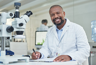 Buy stock photo Portrait of a mature scientist going through paperwork in a lab