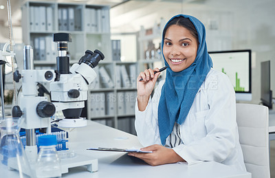 Buy stock photo Portrait of a young scientist conducting research in a laboratory