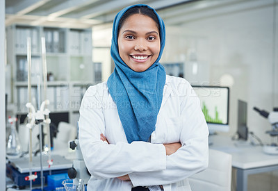 Buy stock photo Portrait of a confident young scientist conducting research in a laboratory
