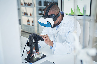Buy stock photo Shot of a scientist using a virtual reality headset while conducting research in a laboratory