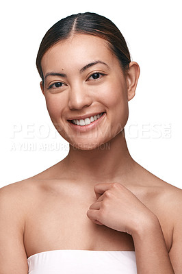 Buy stock photo Shot of a beautiful young woman posing against a white background