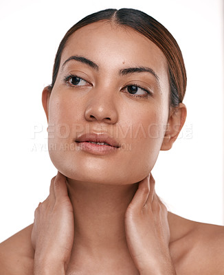 Buy stock photo Shot of a beautiful young woman posing against a white background