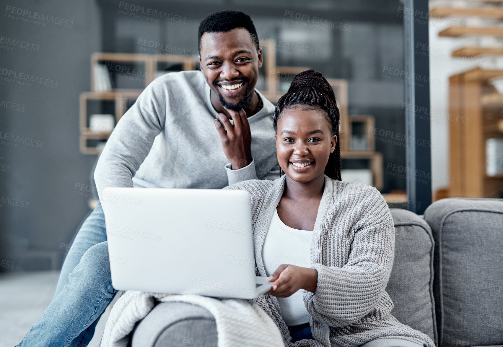 Buy stock photo Happy couple browsing on a laptop, banking online and applying for a home loan, mortgage bond or insurance. Portrait of a black man and woman managing finances and studying with online education