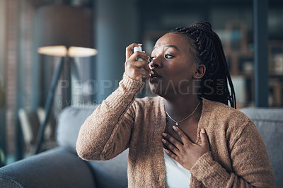 Buy stock photo Asthma attack, medicine and a woman with inhaler to breathe in a house for health and wellness. Anxiety of a sick black person with medication for healthcare, lungs or chest and respiratory problem