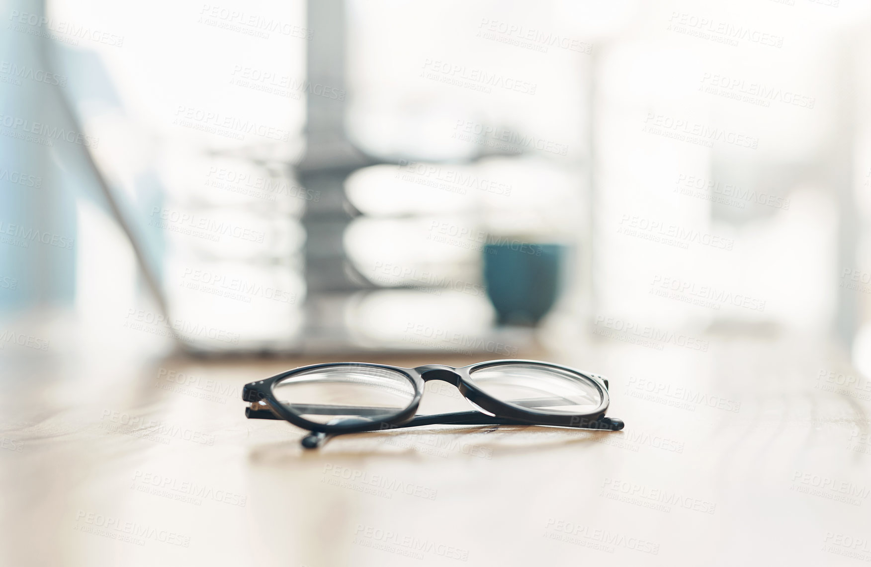 Buy stock photo Closeup shot of spectacles on a table in an office