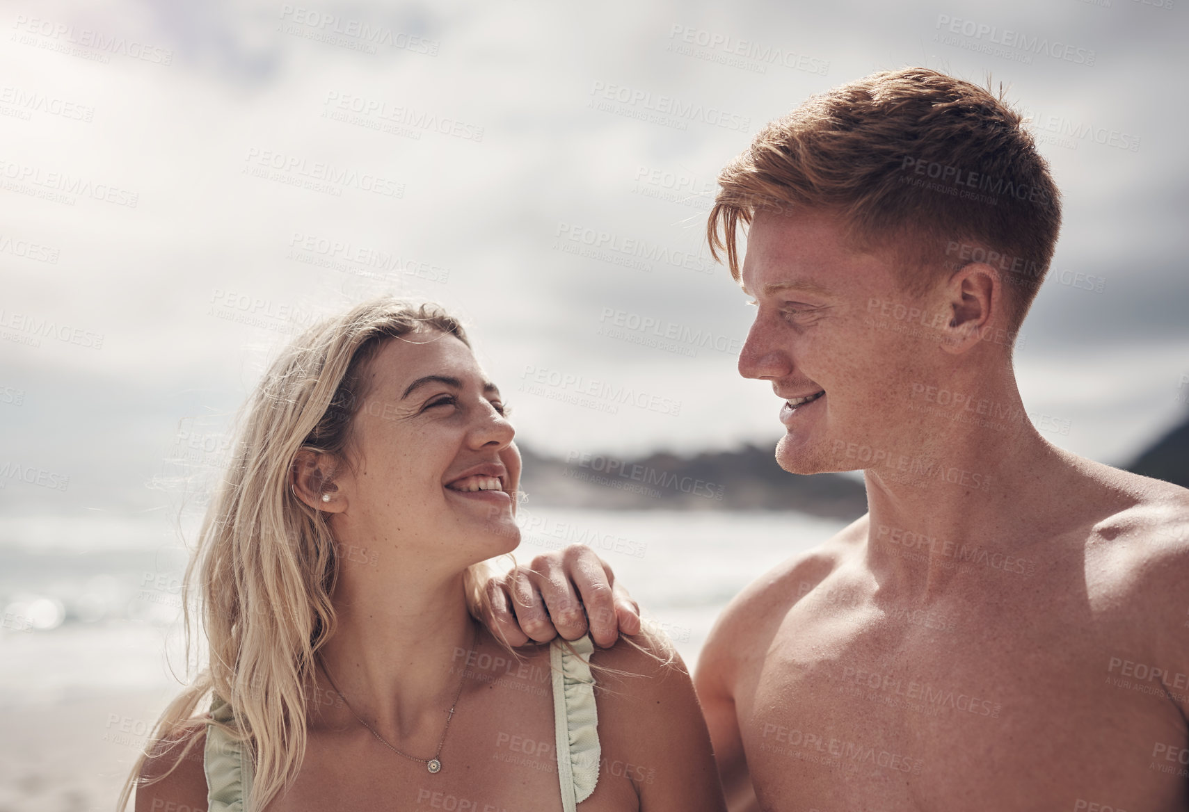 Buy stock photo Shot of a couple spending the day at the beach