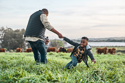 Buy stock photo Shot of an adorable brother and sister having fun with their father on a farm