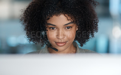 Buy stock photo Cropped shot of a young female agent working in a call centre