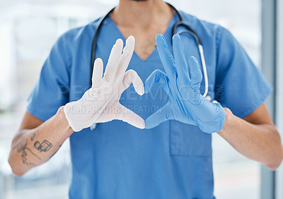 Buy stock photo Closeup shot of a medical practitioner making a heart shape with his hands