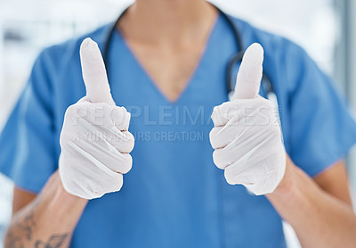 Buy stock photo Closeup shot of a medical practitioner showing thumbs up