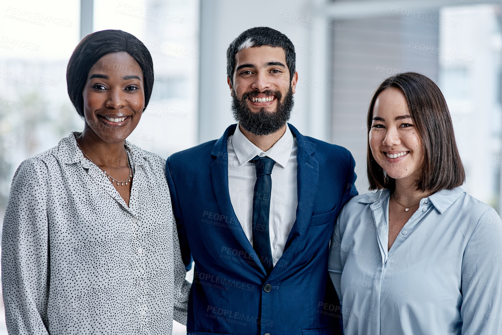 Buy stock photo Portrait of a group of businesspeople standing together in an office