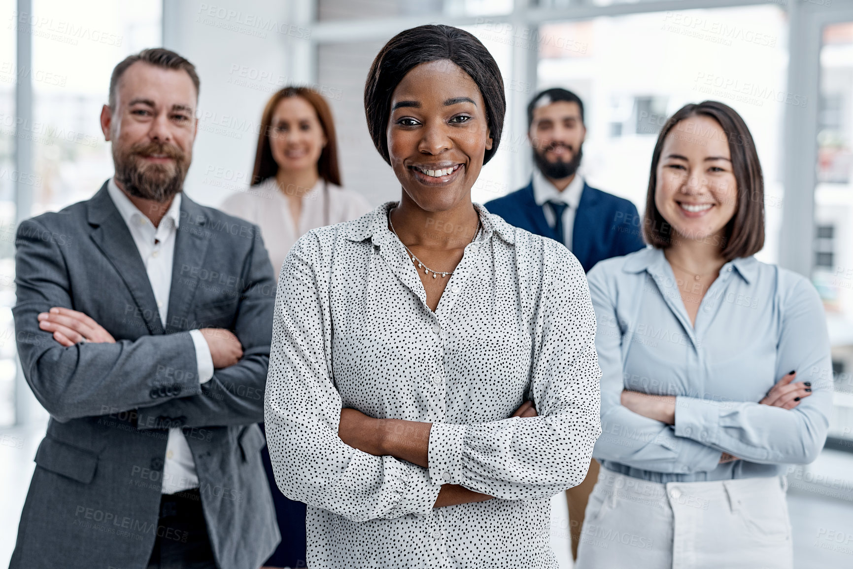 Buy stock photo Portrait of a group of businesspeople standing together in an office