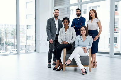 Buy stock photo Portrait of a group of businesspeople posing together in an office