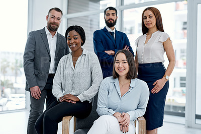 Buy stock photo Portrait of a group of businesspeople posing together in an office