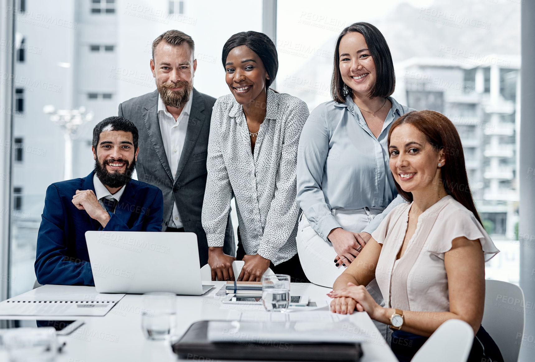 Buy stock photo Portrait of a group of businesspeople having a meeting in an office