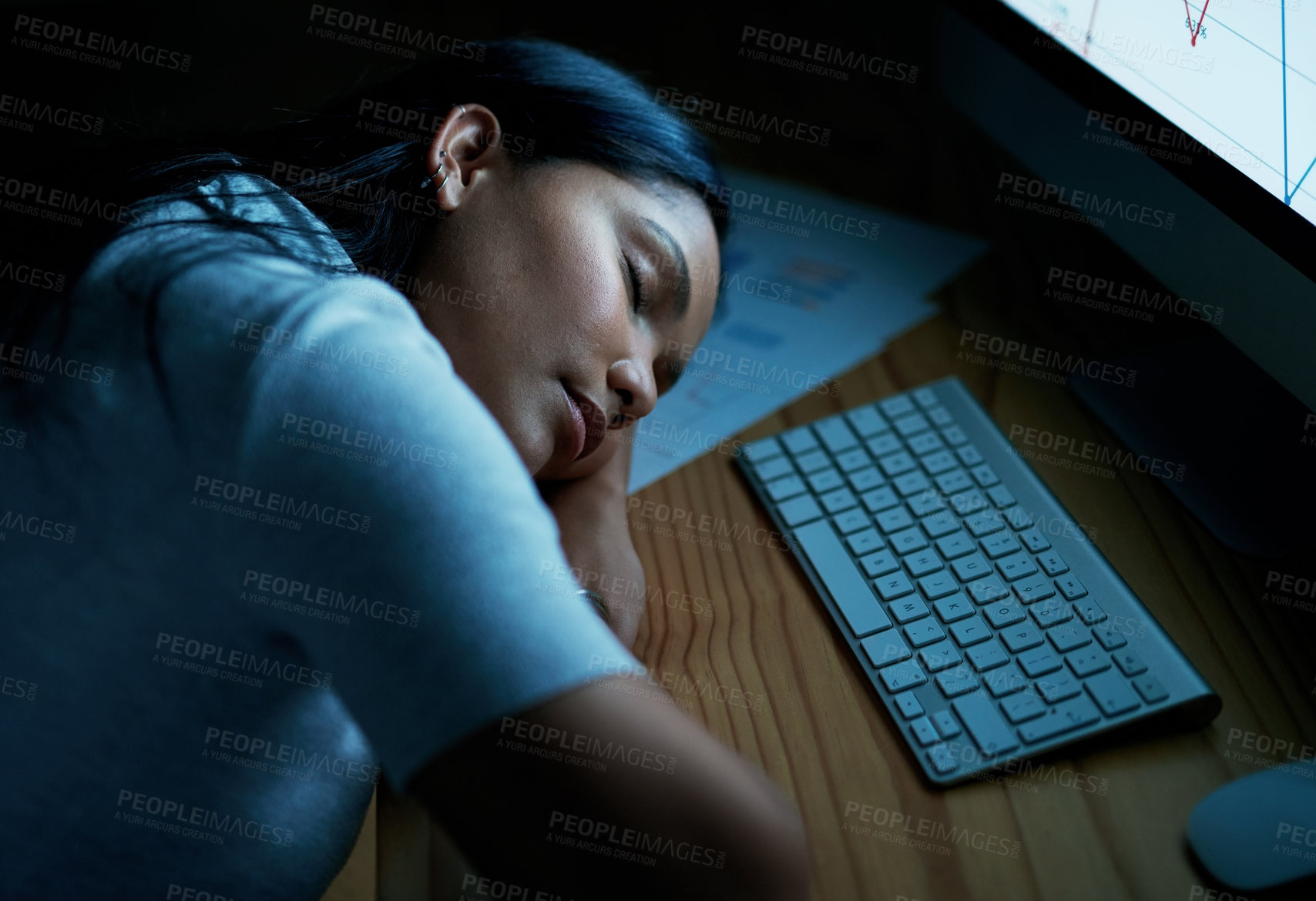 Buy stock photo Shot of young businesswoman sleeping at her desk during a late night in a modern office