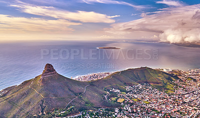 Buy stock photo Aerial landscape view of the beautiful city of Cape Town during the day in summer with copyspace. Top of a scenic view of the mountains, town, and sea in a popular tourist destination for vacation