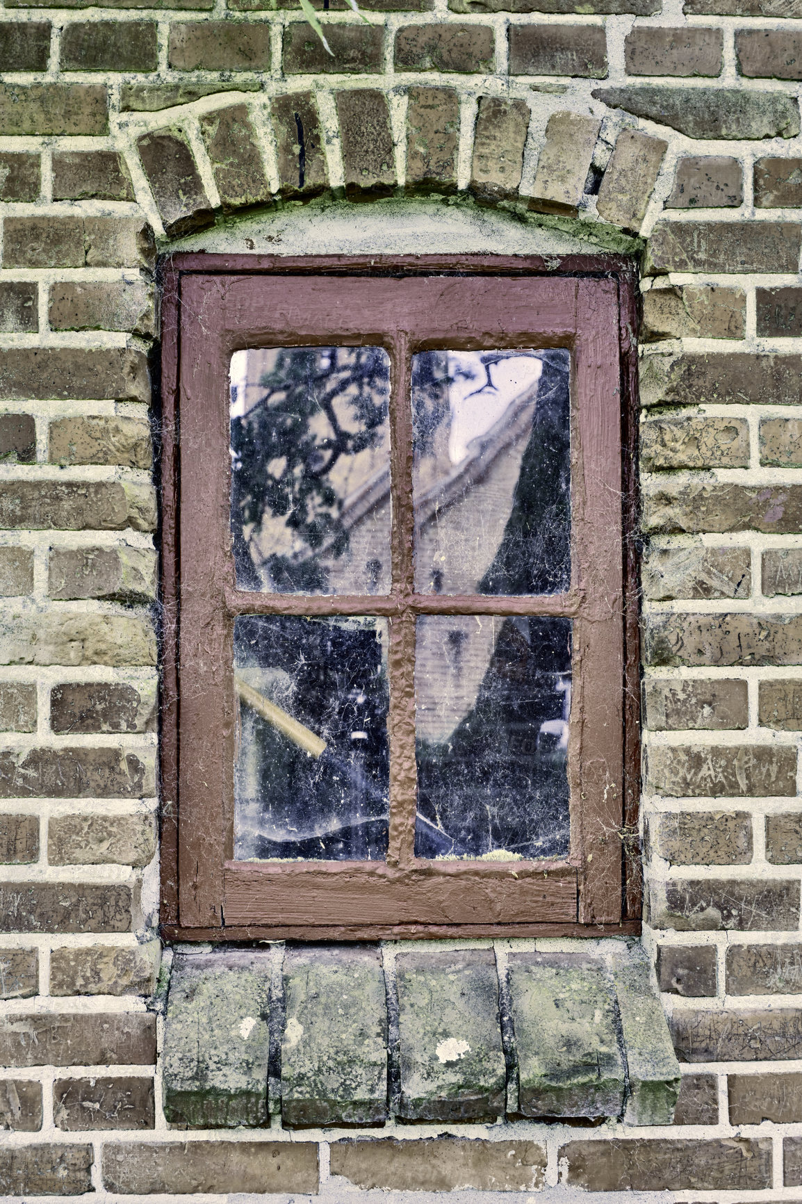 Buy stock photo Closeup of an abandoned window covered in spiderwebs from neglect, poverty and economic crisis. Empty, old and dirty residential brick building or home in village with broken frame on the windowsill