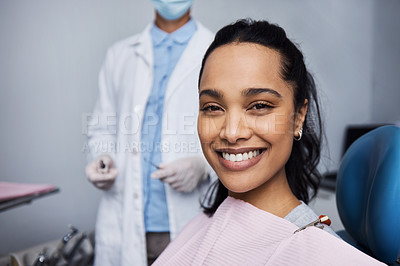 Buy stock photo Portrait of a young woman having dental work done on her teeth