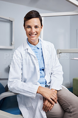 Buy stock photo Portrait of a confident young woman working in a dentist’s office