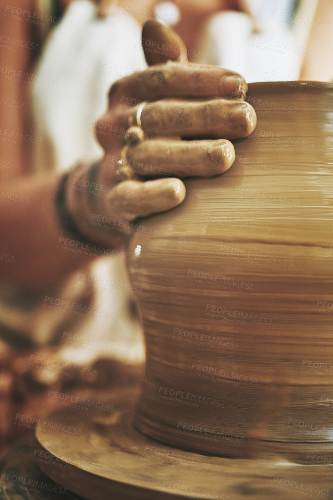 Buy stock photo Clay, hand an shape with woman in pottery workshop for manufacturing or production of ceramics. Creative, design and wheel with artisan in earthenware studio for molding or sculpting of terracotta