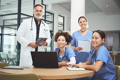 Buy stock photo Portrait of a team of doctors having a meeting in a hospital