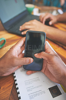 Buy stock photo Cropped shot of two unrecognizable friends sitting together and using technology in a coffeeshop