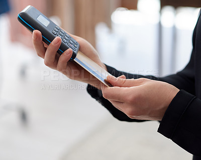 Buy stock photo Closeup shot of an unrecognisable woman using a credit card machine in a store