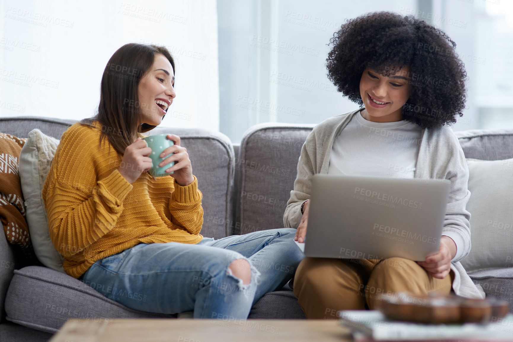 Buy stock photo Friends, happy and sofa in house with laptop for social media, talking and online subscription. Women together, tech and conversation in lounge for web connection, watching video and relax on couch