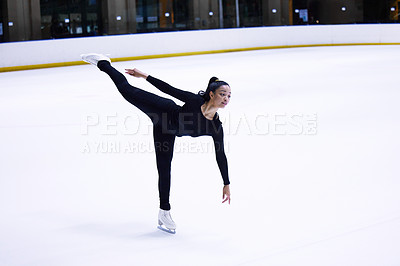 Buy stock photo Sport, woman athlete figure skating and at a sports arena on ice floor. Fitness training or exercise, balance or health wellness and female person skate for competition or tournament in sportswear