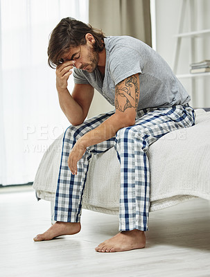 Buy stock photo Man, eye strain and stress on bed and anxiety, sad and jobless or worry for debt and financial crisis. Male person, burnout and unhappy or frustrated, mental health and sad in home for mistake