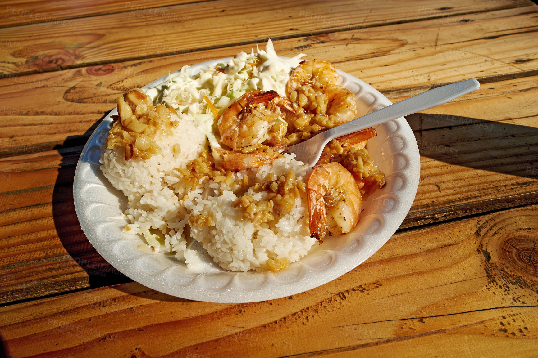 Buy stock photo Closeup of a paella dish being eaten at a restaurant or diner with copy space. Zoom in on a traditional seafood on a plate. Details of a homemade prepared Portuguese gourmet meal