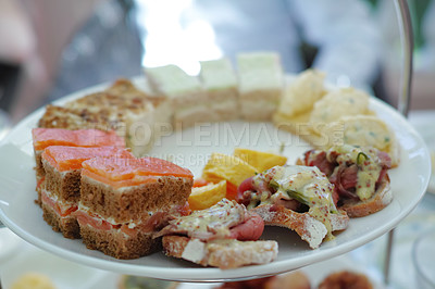 Buy stock photo Tasty food platter at a luxury dinner event on a table. Delicious plate of food served for lunch or dinner at home. Healthy gourmet meal made at a restaurant. Starters or snacks presented at a party
