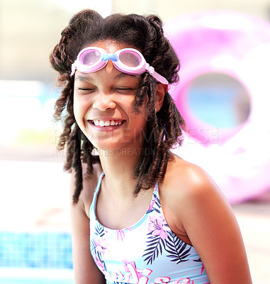 Buy stock photo Cropped shot of a young girl wearing swimming goggles and a bathing suit