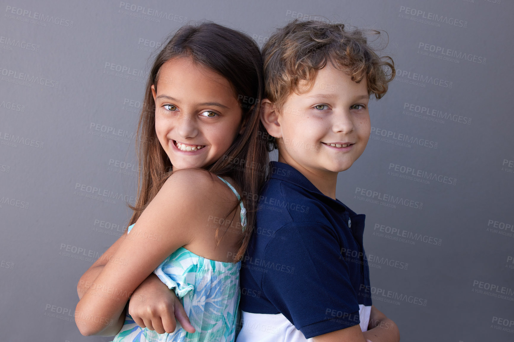 Buy stock photo Studio, smile and portrait of children together with confidence for unity, bonding and teamwork. Siblings, boy and girl with arms crossed on grey background for love, support or childhood development